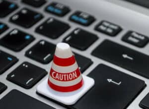 Caution Safety Cone on Laptop